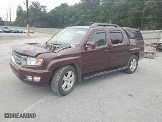 2011 Honda Ridgeline RTL with VIN 5FPYK1F58BB006887, listed as a Copart auction lot 75165964 with 153,615 mi miles and Salvage Title. Bid and sale history available at carsss.com. Image 1.