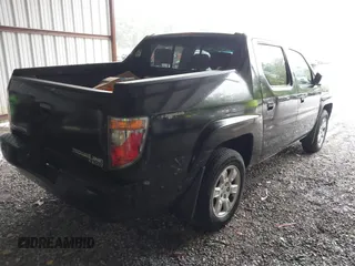 2007 Honda Ridgeline RTL with VIN 2HJYK16547H549241, listed as a IAAI auction lot 42282477 with 214,685 mi miles and . Bid and sale history available at DreamBid. Image 4.