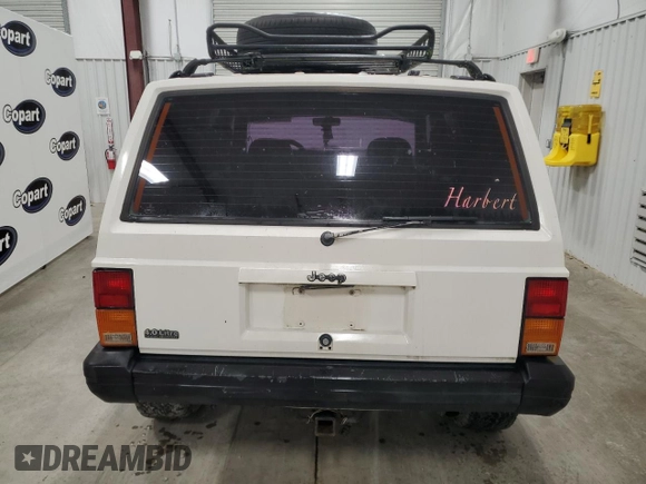 1996 Jeep Cherokee Sport with VIN 1J4FJ68S5TL235927, listed as a Copart auction lot 68942174 with 238,619 mi miles and Clean Title. Bid and sale history available at carsss.com. Image 6.