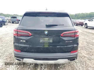 2020 BMW X5 sDrive40i with VIN 5UXCR4C0XLLW63728, listed as a Copart auction lot 56112475 with 65,704 mi miles and Clean title. Bid and sale history available at DreamBid. Image 6.