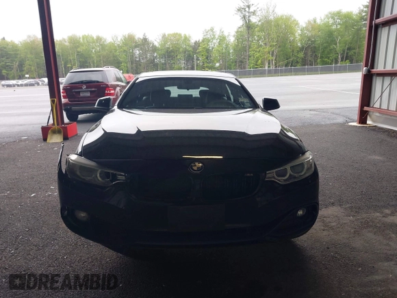 2015 BMW 4 Series 428i xDrive with VIN WBA4C9C57FD331872, listed as a IAAI auction lot 42276675 with 106,543 mi miles and . Bid and sale history available at DreamBid. Image 12.