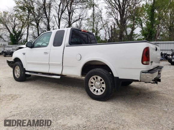 2002 Ford F-150 XL with VIN 1FTRX18L42NB60380, listed as a Copart auction lot 51806955 with 293,591 mi miles and Salvage title. Bid and sale history available at DreamBid. Image 2.