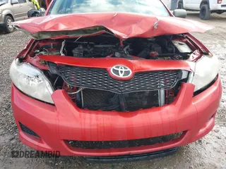 2010 Toyota Corolla with VIN 2T1BU4EE2AC309033, listed as a IAAI auction lot 41521887 with 305,228 mi miles. Bid and sale history available at carsss.com. Image 6.