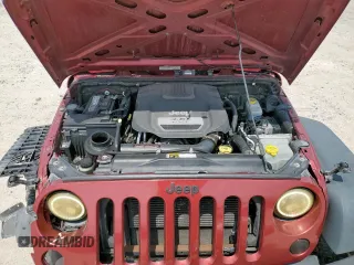 2013 Jeep Wrangler Unlimited Sport z VIN 1C4BJWDGXDL606491, wystawiony jako Copart lot #56065425 z przebiegiem 168 709 mil mil oraz Szkoda całkowita • Salvage title. Historia ofert i sprzedaży dostępna na DreamBid. Obrazek 12.