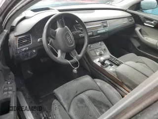 2018 Audi A8 z VIN WAU44AFD0JN000782, wystawiony jako Copart lot #68575924 z przebiegiem 99 098 mil mil oraz Nie do naprawy • Non repairable. Historia ofert i sprzedaży dostępna na DreamBid. Obrazek 9.