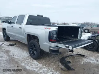 2014 Chevrolet Silverado 1500 LT with VIN 3GCUKREC7EG314914, listed as a IAAI auction lot 41368651 with 133,172 mi miles. Bid and sale history available at carsss.com. Image 3.