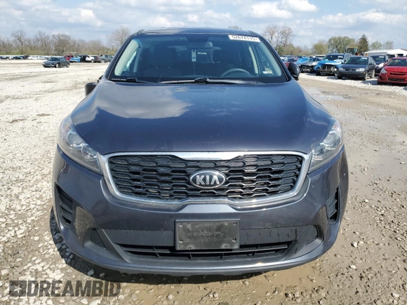 2019 Kia Sorento LX z VIN 5XYPG4A57KG486900, wystawiony jako Copart lot #52674115 z przebiegiem 105 259 mil mil oraz Szkoda całkowita • Salvage title. Historia ofert i sprzedaży dostępna na DreamBid. Obrazek 5.