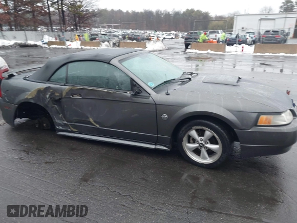 2004 Ford Mustang GT Deluxe z VIN 1FAFP45X74F128442, wystawiony jako IAAI lot #41580930 z przebiegiem 100 801 mil mil oraz . Historia ofert i sprzedaży dostępna na DreamBid. Obrazek 14.