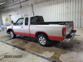 2000 Nissan Frontier XE with VIN 1N6DD26S8YC337811, listed as a Copart auction lot 54775915 with 129,427 mi miles and Salvage title. Bid and sale history available at DreamBid. Image 2.