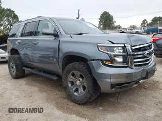 2019 Chevrolet Tahoe LT with VIN 1GNSKBKC8KR283954, listed as a IAAI auction lot 41587485 with 110,631 mi miles and . Bid and sale history available at DreamBid. Image 1.