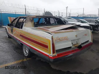 1993 Cadillac Fleetwood z VIN 1G6DW5276PR720371, wystawiony jako IAAI lot #41729298 z przebiegiem Nie podano mil oraz . Historia ofert i sprzedaży dostępna na DreamBid. Obrazek 3.