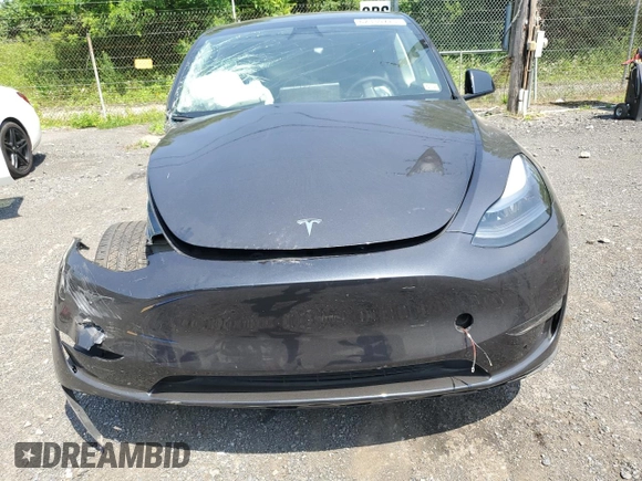 2024 Tesla Model Y с VIN 7SAYGDED1RF092027, выставлен на аукционе Copart как лот 62330775 с пробегом 22 010 миль миль и Списание • Salvage title. История ставок и продаж доступна на DreamBid. Изображение 5.