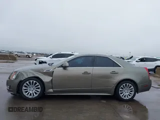 2010 Cadillac CTS with VIN 1G6DK5EG0A0137216, listed as a IAAI auction lot 41966117 with 177,686 mi miles and . Bid and sale history available at DreamBid. Image 14.