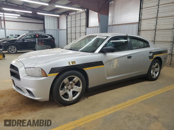 2013 Dodge Charger Police with VIN 2C3CDXAT6DH642327, listed as a Copart auction lot 50945865 with 179,229 mi miles and Salvage Title. Bid and sale history available at DreamBid. Image 1.