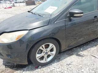 2013 Ford Focus SE with VIN 1FADP3F27DL278668, listed as a IAAI auction lot 42482400 with 132,276 mi miles and . Bid and sale history available at DreamBid. Image 12.