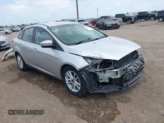 2018 Ford Focus SE z VIN 1FADP3F29JL328952, wystawiony jako IAAI lot #42032684 z przebiegiem 67 060 mil mil oraz . Historia ofert i sprzedaży dostępna na DreamBid. Obrazek 1.