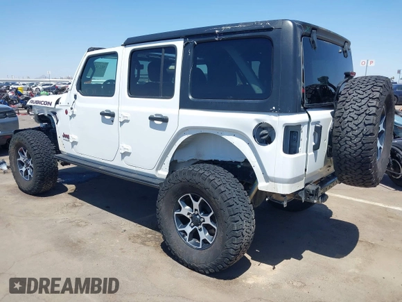 2021 Jeep Wrangler Unlimited Rubicon with VIN 1C4HJXFGXMW850556, listed as a IAAI auction lot 42234282 with 80,834 mi miles and . Bid and sale history available at DreamBid. Image 3.