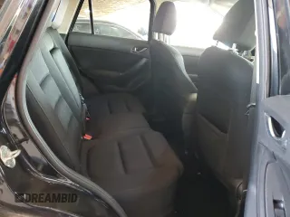 2016 Mazda CX-5 Touring с VIN JM3KE4CY8G0851144, выставлен на аукционе Copart как лот 62594925 с пробегом 178 741 миль миль и Чистый • Clean title. История ставок и продаж доступна на DreamBid. Изображение 11.