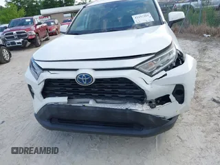 2020 Toyota RAV4 Hybrid XLE z VIN 2T3RWRFV7LW072553, wystawiony jako IAAI lot #42197281 z przebiegiem 166 115 mil mil oraz . Historia ofert i sprzedaży dostępna na DreamBid. Obrazek 6.
