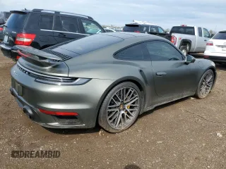 2023 Porsche 911 Turbo z VIN WP0AD2A99PS257416, wystawiony jako Copart lot #54127325 z przebiegiem 7 252 mil mil oraz Szkoda całkowita • Salvage title. Historia ofert i sprzedaży dostępna na DreamBid. Obrazek 3.