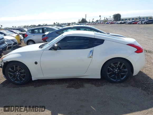 2016 Nissan 370Z Sport z VIN JN1AZ4EH9GM931683, wystawiony jako IAAI lot #42000779 z przebiegiem 113 919 mil mil oraz . Historia ofert i sprzedaży dostępna na DreamBid. Obrazek 14.
