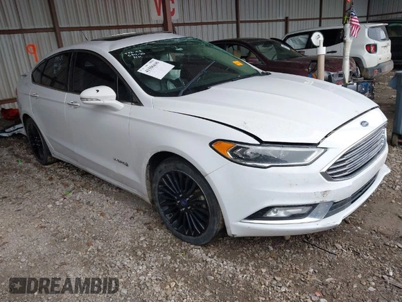 2017 Ford Fusion Hybrid Titanium with VIN 3FA6P0RU1HR322997, listed as a IAAI auction lot 41506630 with 263,589 mi miles and . Bid and sale history available at DreamBid. Image 1.