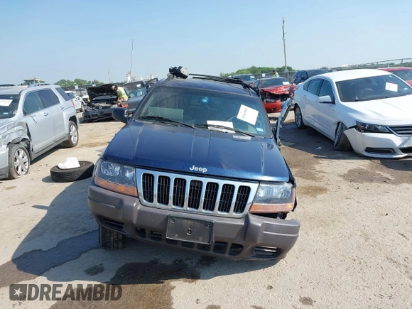 2000 Jeep Grand Cherokee Laredo with VIN 1J4G248S5YC413977, listed as a IAAI auction lot 42045808 with Not provided miles and . Bid and sale history available at DreamBid. Image 12.