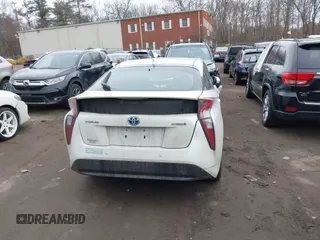 2018 Toyota Prius Two with VIN JTDKARFU8J3059124, listed as a IAAI auction lot 41709364 with 79,982 mi miles. Bid and sale history available at carsss.com. Image 17.
