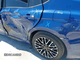 2025 Toyota Camry LE with VIN 4T1DAACK3SU104152, listed as a IAAI auction lot 42039337 with 1,423 mi miles and . Bid and sale history available at DreamBid. Image 18.