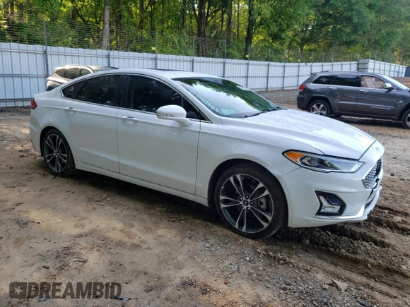 2020 Ford Fusion Titanium with VIN 3FA6P0D96LR152910, listed as a Copart auction lot 55389355 with 105,690 mi miles and Salvage title. Bid and sale history available at DreamBid. Image 4.