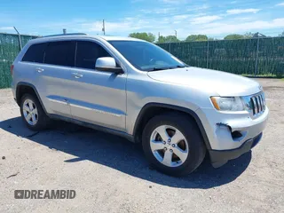 2011 Jeep Grand Cherokee Laredo with VIN 1J4RR4GG2BC737400, listed as a IAAI auction lot 42259167 with 153,211 mi miles and . Bid and sale history available at DreamBid. Image 1.