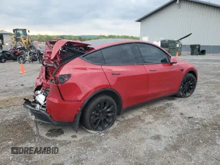 2023 Tesla Model Y Long Range z VIN 7SAYGAEE1PF690008, wystawiony jako Copart lot #54441735 z przebiegiem 38 291 mil mil oraz Szkody całkowita. Historia ofert i sprzedaży dostępna na DreamBid. Obrazek 3.