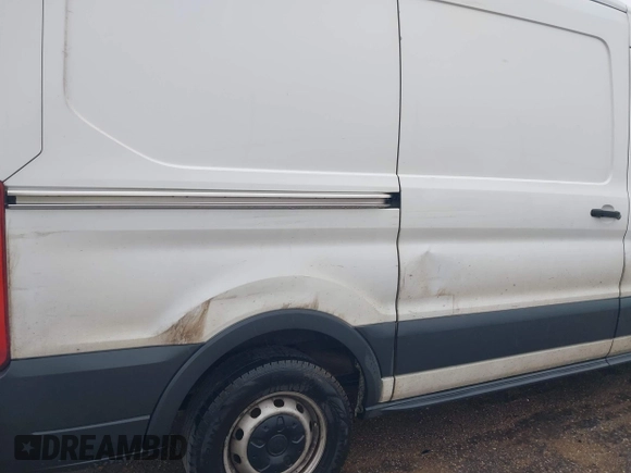 2018 Ford Transit with VIN 1FTYE1CM1JKA35810, listed as a IAAI auction lot 42178750 with 254,654 mi miles and . Bid and sale history available at DreamBid. Image 6.