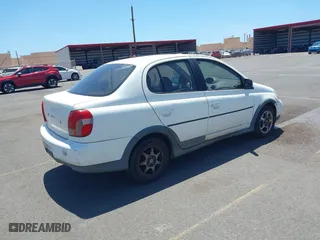 2000 Toyota ECHO with VIN JTDBT123XY0016327, listed as a IAAI auction lot 41988718 with 231,561 mi miles. Bid and sale history available at carsss.com. Image 4.