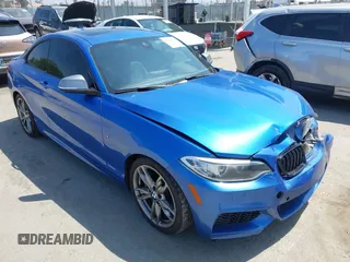 2014 BMW 2 Series M235i with VIN WBA1J7C52EVW84588, listed as a IAAI auction lot 42490194 with 103,998 mi miles and . Bid and sale history available at DreamBid. Image 1.