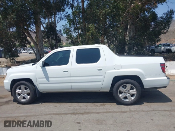 2012 Honda Ridgeline RTL z VIN 5FPYK1F57CB455267, wystawiony jako IAAI lot #42462296 z przebiegiem 186 451 mil mil oraz . Historia ofert i sprzedaży dostępna na DreamBid. Obrazek 14.