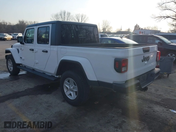 2023 Jeep Gladiator Sport S z VIN 1C6HJTAG7PL535209, wystawiony jako IAAI lot #41483780 z przebiegiem 39 376 mil mil oraz . Historia ofert i sprzedaży dostępna na DreamBid. Obrazek 3.