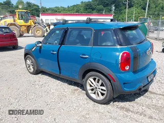 2011 MINI Countryman S with VIN WMWZC5C57BWM11279, listed as a IAAI auction lot 42649621 with 100,000 mi miles and . Bid and sale history available at DreamBid. Image 3.