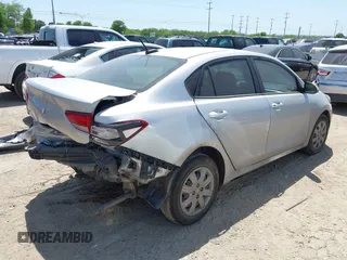 2023 Kia Rio S z VIN 3KPA24AD6PE600384, wystawiony jako IAAI lot #42003099 z przebiegiem 27 001 mil mil oraz . Historia ofert i sprzedaży dostępna na DreamBid. Obrazek 4.