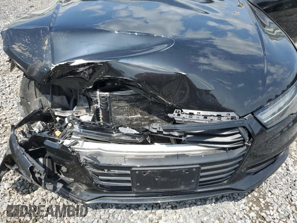 2018 Audi A7 Premium Plus with VIN WAUW3AFC8JN077743, listed as a Copart auction lot 58638925 with 49,062 mi miles and Salvage title. Bid and sale history available at DreamBid. Image 11.