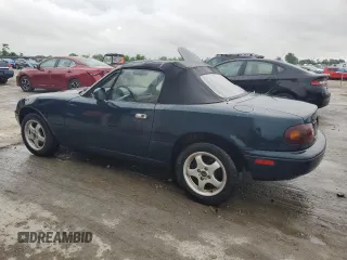 1996 Mazda MX-5 Miata z VIN JM1NA3531T0718068, wystawiony jako Copart lot #56614065 z przebiegiem 116 486 mil mil oraz Szkody całkowita. Historia ofert i sprzedaży dostępna na DreamBid. Obrazek 2.