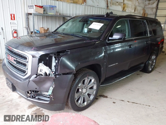 2015 GMC Yukon XL SLT with VIN 1GKS2HKC6FR667110, listed as a IAAI auction lot 41472250 with 141,383 mi miles. Bid and sale history available at carsss.com. Image 17.