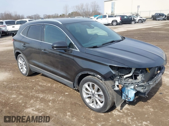2015 Lincoln MKC with VIN 5LMTJ2AH0FUJ04461, listed as a IAAI auction lot 41804169 with 97,187 mi miles. Bid and sale history available at carsss.com. Image 1.