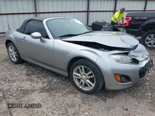 2011 Mazda MX-5 Miata Sport with VIN JM1NC2JF4B0218019, listed as a IAAI auction lot 42447368 with 113,083 mi miles and . Bid and sale history available at DreamBid. Image 1.