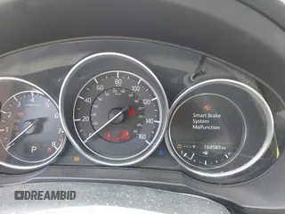2018 Mazda CX-5 Grand Touring with VIN JM3KFADM4J0335913, listed as a IAAI auction lot 42326044 with 104,583 mi miles and . Bid and sale history available at DreamBid. Image 7.