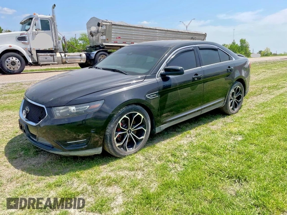 2013 Ford Taurus SHO z VIN 1FAHP2KT6DG144172, wystawiony jako Copart lot #63161585 z przebiegiem Nie podano mil oraz Czysty tytuł • Clean title. Historia ofert i sprzedaży dostępna na DreamBid. Obrazek 2.