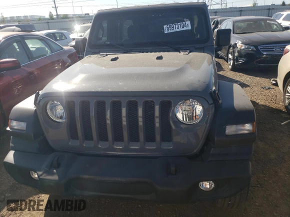 2023 Jeep Wrangler Sport with VIN 1C4HJXDN1PW701944, listed as a Copart auction lot 69973104 with 24,733 mi miles and Salvage Title. Bid and sale history available at DreamBid. Image 5.