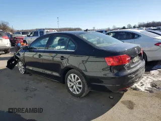 2014 Volkswagen Jetta SE with VIN 3VWD17AJ9EM400204, listed as a Copart auction lot 42484055 with 137,287 mi miles and Salvage title. Bid and sale history available at DreamBid. Image 2.