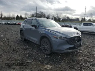 2024 Mazda CX-5 S Carbon Edition z VIN JM3KFBCM4R0392759, wystawiony jako Copart lot #45571245 z przebiegiem 7594 mil mil oraz Szkody całkowita. Historia ofert i sprzedaży dostępna na DreamBid. Obrazek 4.