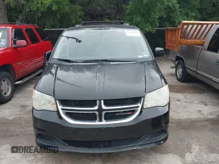2013 Dodge Grand Caravan SXT with VIN 2C4RDGCG0DR552784, listed as a IAAI auction lot 42116395 with 96,917 mi miles and . Bid and sale history available at DreamBid. Image 6.